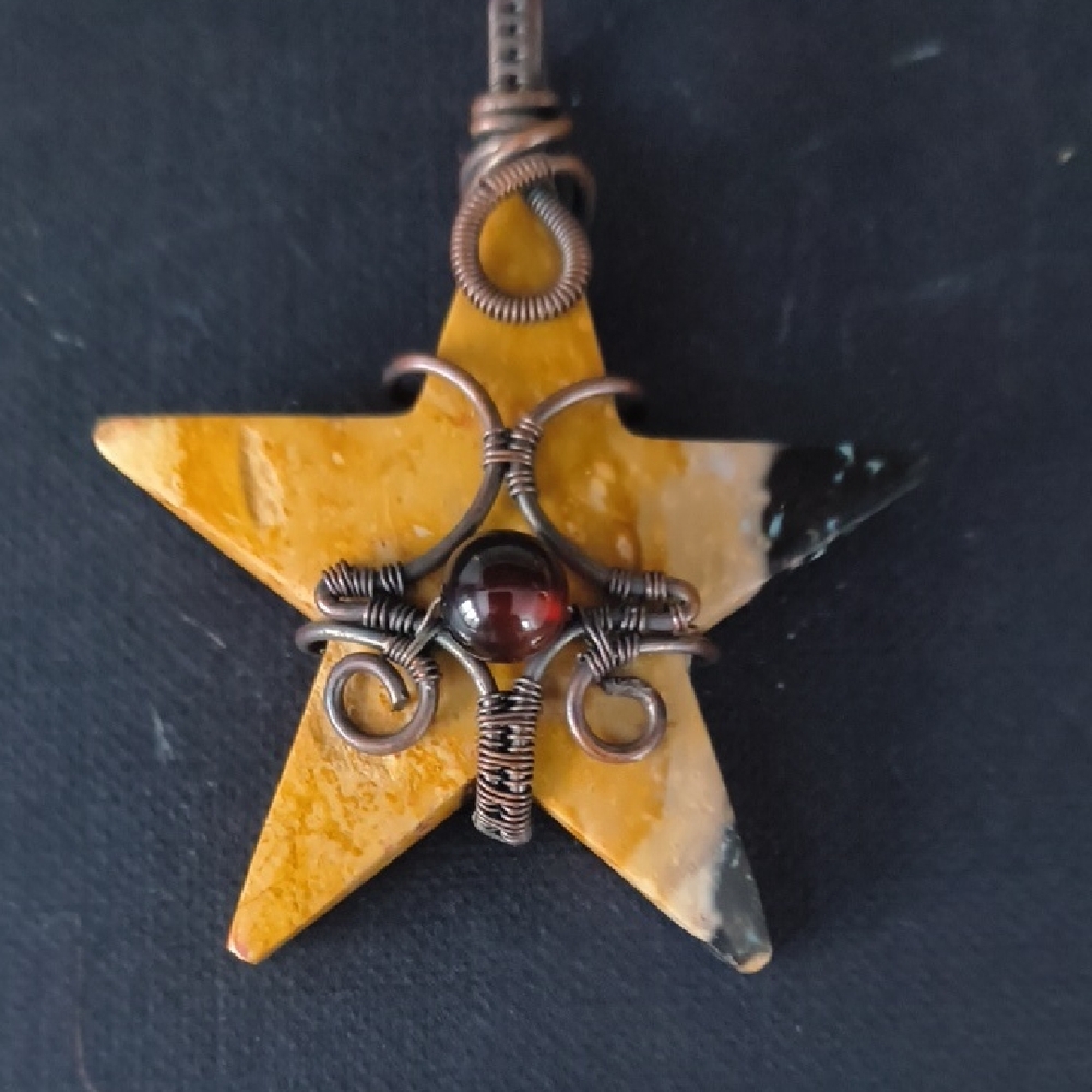 Handcrafted Fossil Palmroot Star Pendant